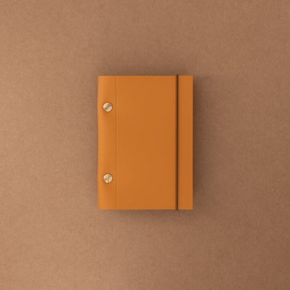 Carnet Héritage cuir gold vis laiton de La Compagnie du Kraft